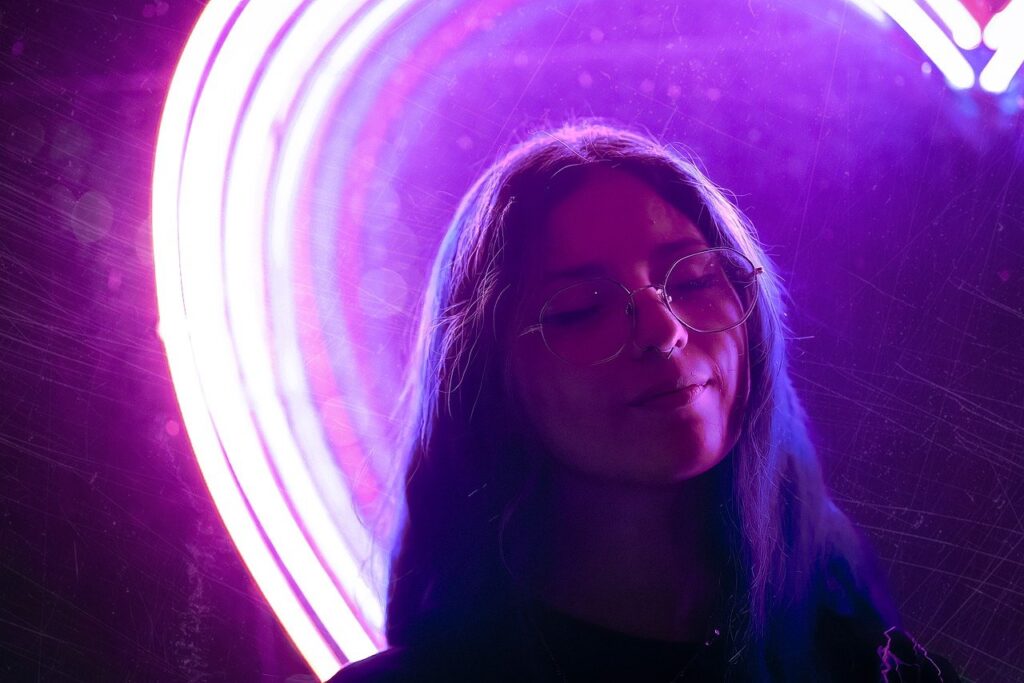 woman, model, glasses, youth, colorful, light, heart, portrait, purple, neon light, pink, youth, colorful, colorful, light, light, light, light, light, heart, purple, purple, purple, pink